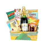 Gift hamper with snacks and sparkling juice for festive flower delivery in Singapore