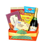 Gift hamper with assorted snacks and sparkling drink, ideal for flower delivery gifting