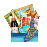 Gift hamper with assorted snacks, grape juice, sweets and decorative peacock for flower delivery
