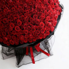 Large red rose bouquet with black wrapping for flower delivery in Singapore