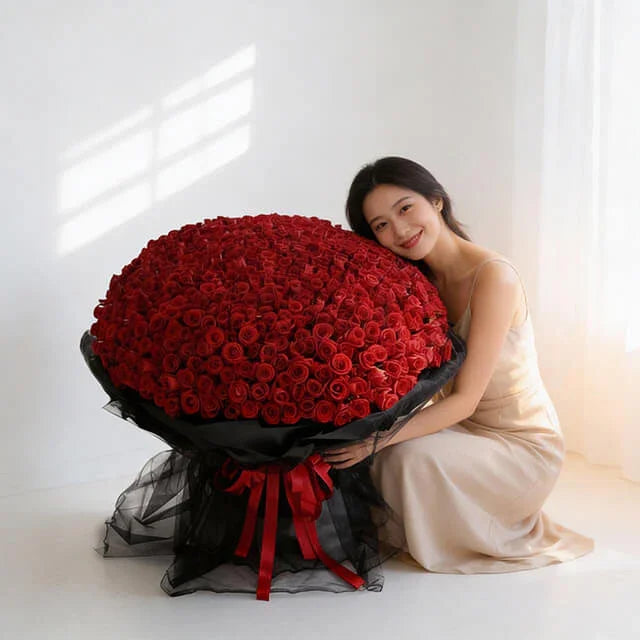 Woman with giant bouquet of red roses, perfect for flower delivery in Singapore