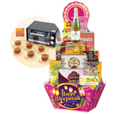 Deepavali gift hamper with assorted snacks, sparkling drink, tea set, ideal for flower delivery