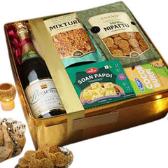 Gift hamper with snacks, sparkling drink, and sweets for festive flower delivery Singapore