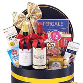 Luxury gift hamper with wine, chocolates, and snacks for flower delivery in Singapore
