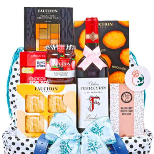 Luxury gift hamper with wine, biscuits, chocolate and tea for flower delivery in Singapore