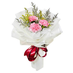 Elegant flower bouquet with pink carnations and greenery, ideal for flower delivery in Singapore