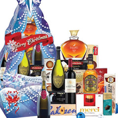 Festive Christmas hamper with flowers, wine, gourmet snacks and chocolate, perfect for flower delivery gifting.