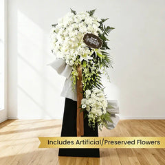 Standing condolence wreath with white artificial flowers for sympathy flower delivery