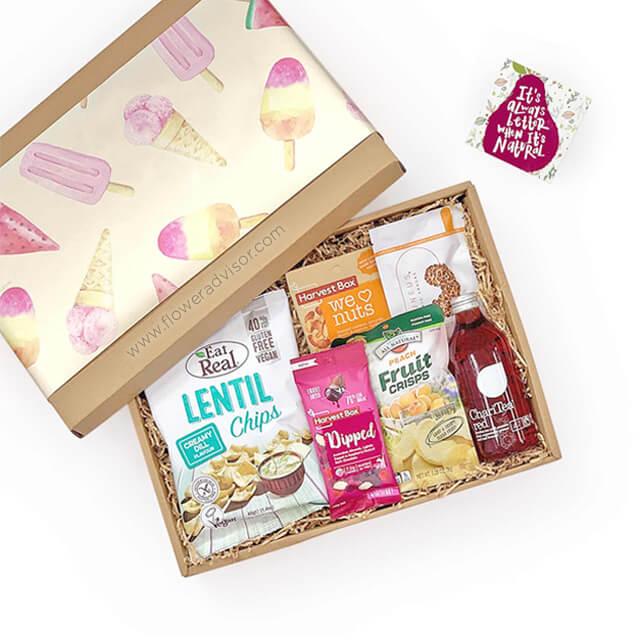 Gift box with snacks and rooibos tea, ideal for flower delivery and gifting in Singapore