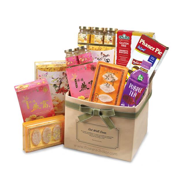 Gift hamper with snacks, biscuits, and tea for flower delivery in Singapore
