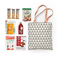 Gift hamper with healthy snacks, tea and tote bag, ideal for floral gift delivery in Singapore