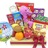 Get well soon flower and fruit hamper with snacks, plush toy, and balloon for delivery