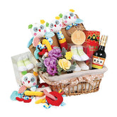 Flower delivery gift basket with fresh yellow and purple flowers, plush toys, and baby gifts