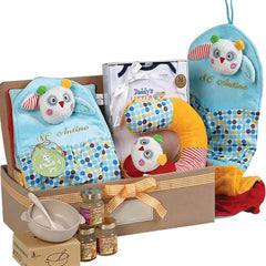 Baby gift hamper with plush owl toys, baby clothes, and food jars, ideal for flower delivery gifts