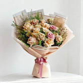 Elegant pastel rose and carnation bouquet with greenery, perfect for flower delivery in Singapore