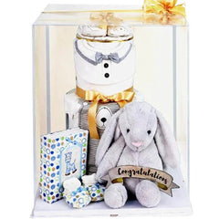 Baby gift set with plush bunny, baby essentials, and congratulatory flower delivery arrangement