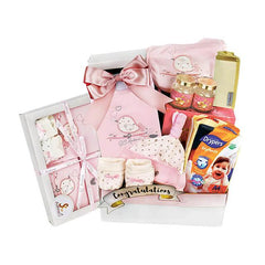 Baby gift hamper with pink baby clothes, diapers, and gifts for flower delivery in Singapore