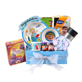 Newborn baby gift hamper with plush toy, baby tableware, snacks and diapers, ideal for flower delivery.