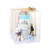 Newborn gift hamper with soft toy, baby items and drinks for flower delivery in Singapore
