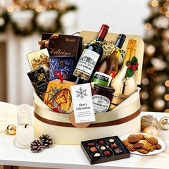 Festive gift hamper with wine, gourmet treats, and chocolates for holiday flower delivery