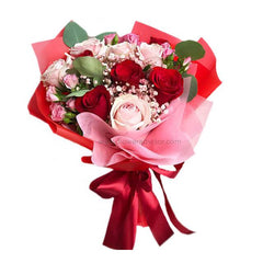 Elegant red and pink rose bouquet with greenery, perfect for flower delivery in Singapore