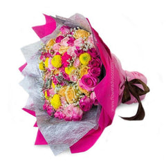 Mixed flower bouquet with pink roses, yellow blooms, perfect for flower delivery Singapore