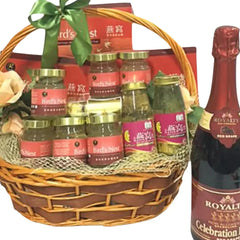 Gift basket with bird's nest drinks, flowers, and sparkling juice for flower delivery