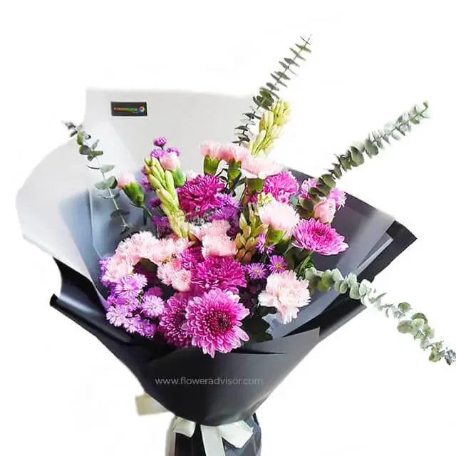 Pink and purple flower bouquet with eucalyptus, ideal for flower delivery in Singapore