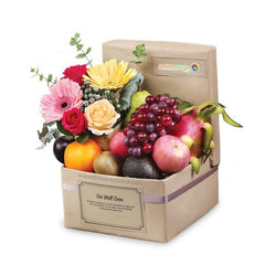 Flower delivery box with fresh mixed flowers and assorted fruits arrangement for gifting