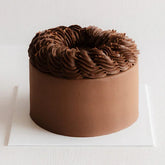 Chocolate cake with rich frosting, perfect for flower and cake delivery in Singapore