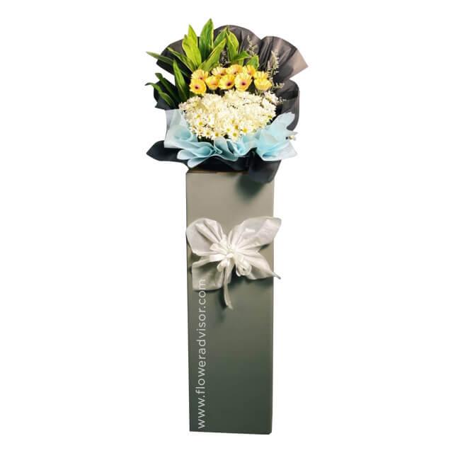Elegant flower stand with yellow and white fresh flowers for delivery in Singapore