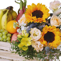 Flower delivery crate with sunflowers, assorted blooms, fresh fruits in Singapore