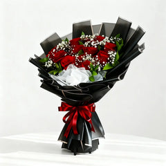 Elegant red rose bouquet with black wrapping for flower delivery in Singapore