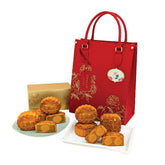 Elegant red floral gift bag with mooncakes, ideal for flower and gift delivery in Singapore
