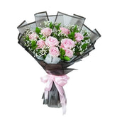 Elegant pink rose bouquet with baby's breath, arranged for flower delivery in Singapore