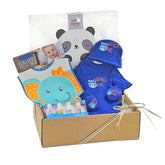Baby gift hamper with blue clothing, animal bib, baby toiletries, and gift box for delivery