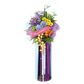 Colorful congratulations flower stand with mixed fresh blooms for delivery