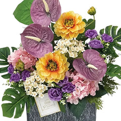 Colorful artificial flower arrangement in a vase, perfect for flower delivery