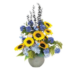 Bright sunflower and blue hydrangea arrangement in vase for flower delivery