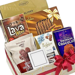 Gift basket with assorted snacks, cookies, chocolates, and a red bow for flower delivery.