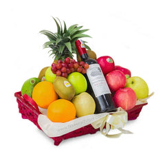 Gift basket with assorted fresh fruits and wine for flower delivery in Singapore
