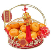 Festive Chinese New Year hamper with fresh oranges, gold ingots, and floral delivery decor