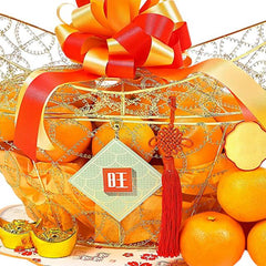 Festive Chinese New Year hamper with oranges, decorative gold basket, and flower gift delivery