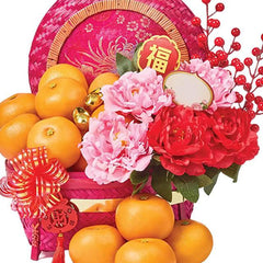 Festive flower hamper with orange fruits and peony flowers, perfect for delivery