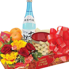 Chinese New Year flower hamper with red roses, yellow blooms, oranges, snacks, and wine for delivery