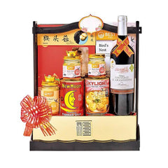 Chinese New Year gourmet hamper with wine, bird's nest, and festive food, ideal for gift delivery