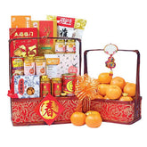 Chinese New Year festive hamper with oranges, snacks, and decorative elements for delivery