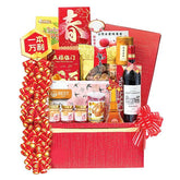 Chinese New Year hamper with festive snacks, wine, and flowers for flower delivery in Singapore