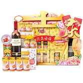 Festive Chinese New Year flower hamper with wine, gifts, and floral decorations for delivery