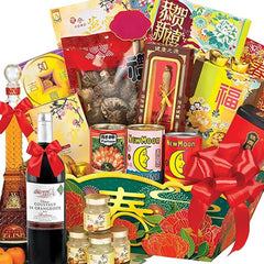 Chinese New Year flower delivery hamper with festive treats, wine, and decorative red bows